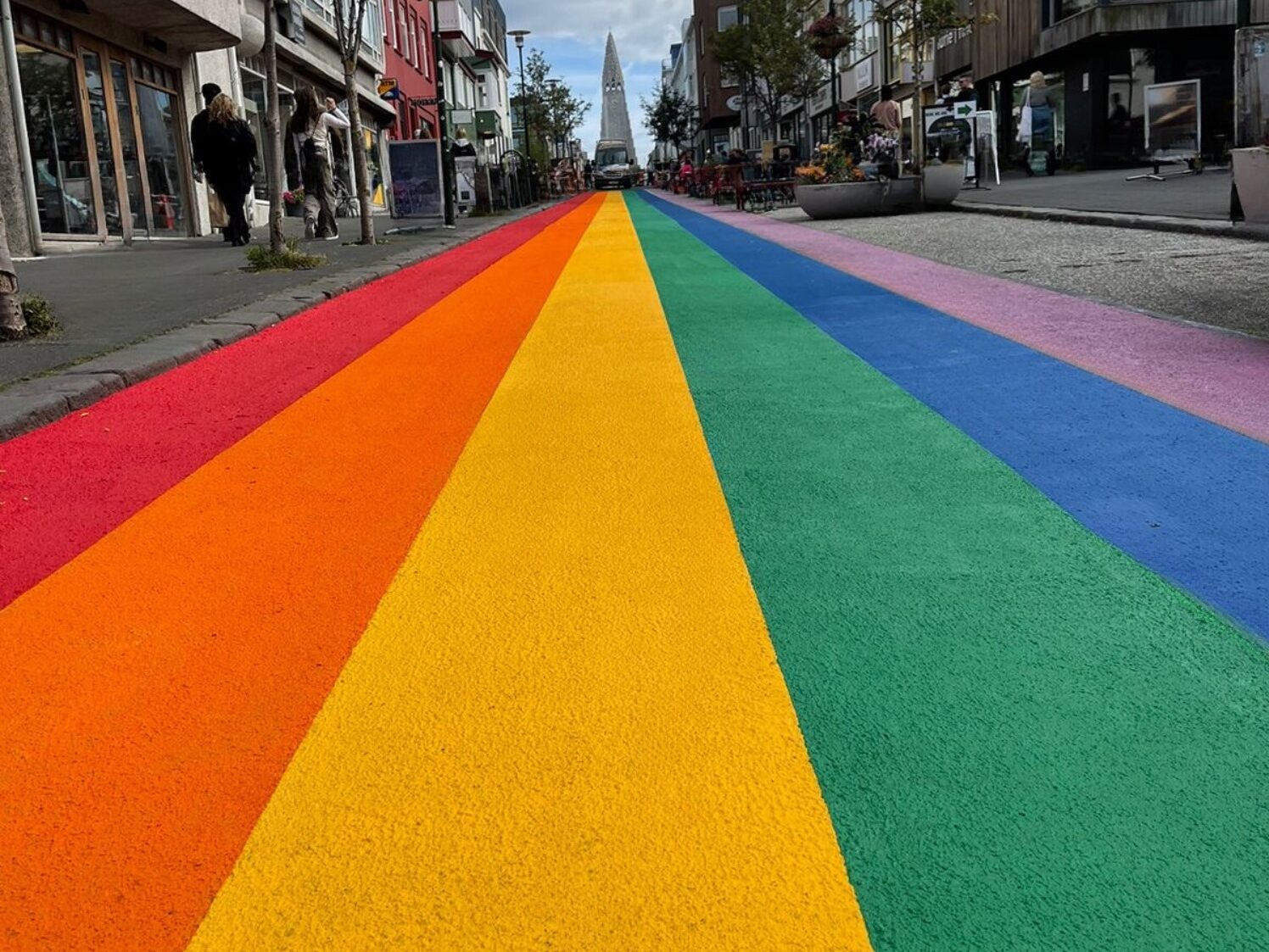 Close-up of rainbow street surface in Reykjavik made with an MMA based product Robur Grip, part of the Prismo Decorative Surfacing and MMA range